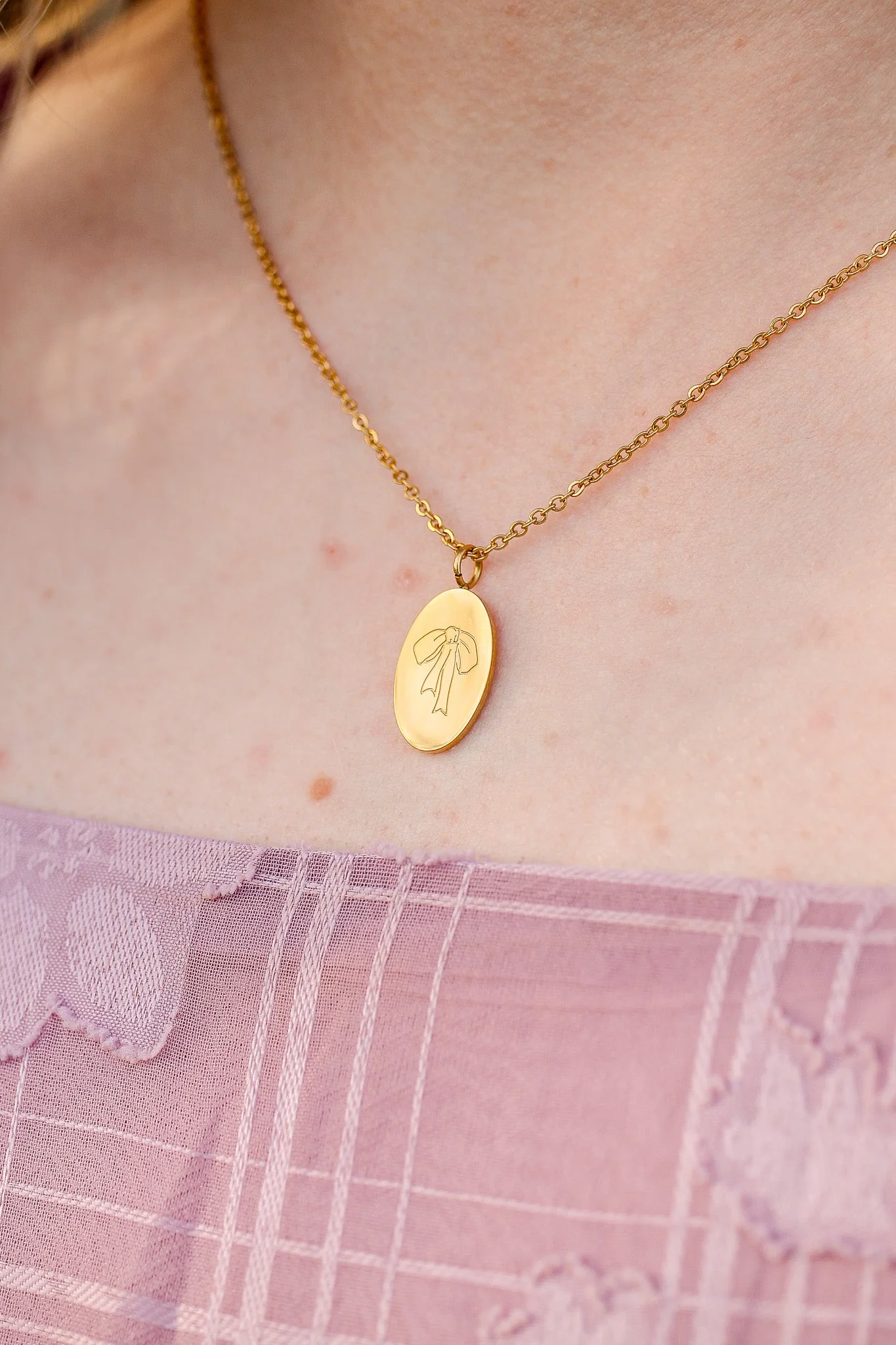 Bow Pendant Necklace in Gold - Image 11