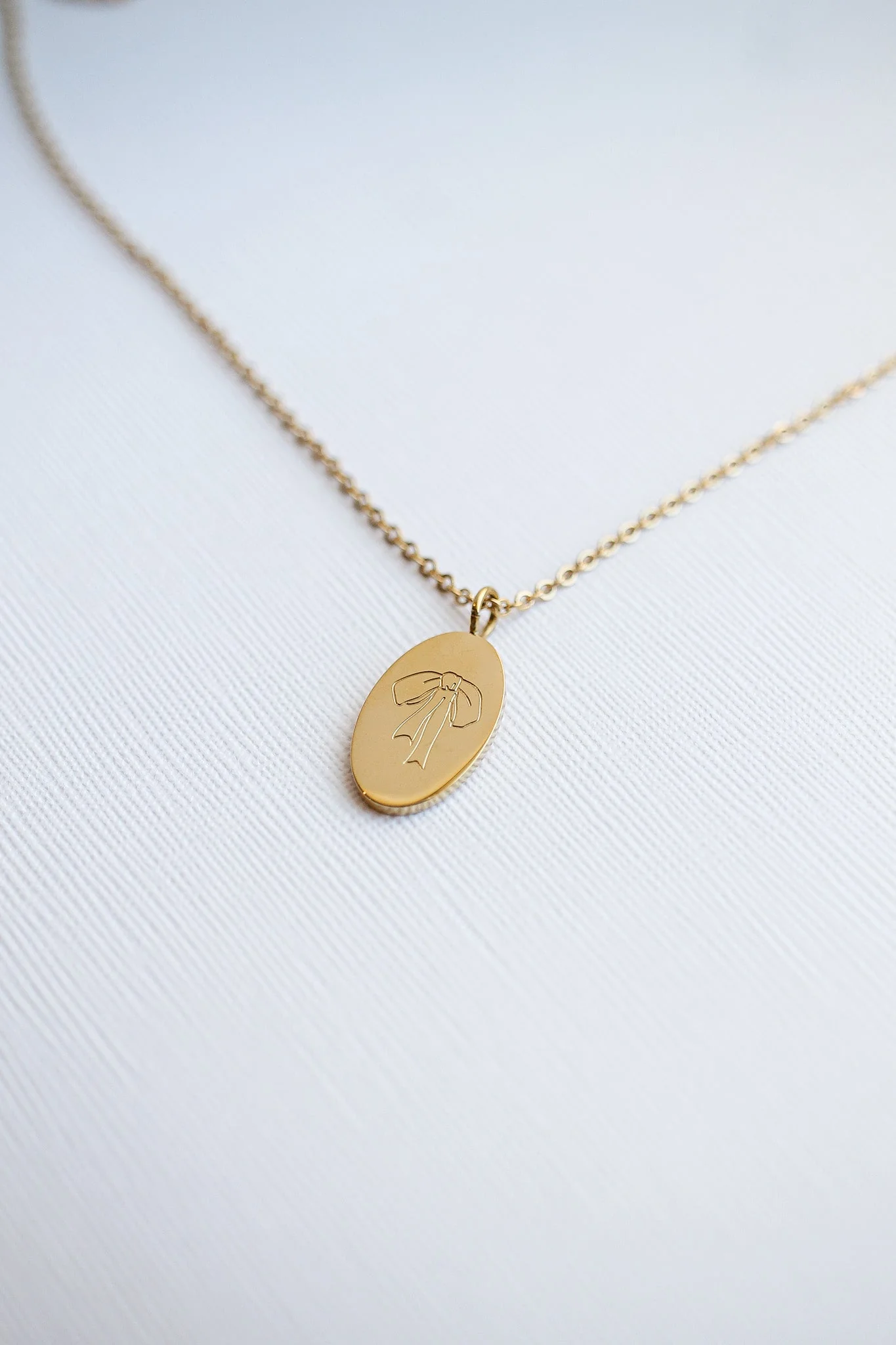 Bow Pendant Necklace in Gold - Image 6